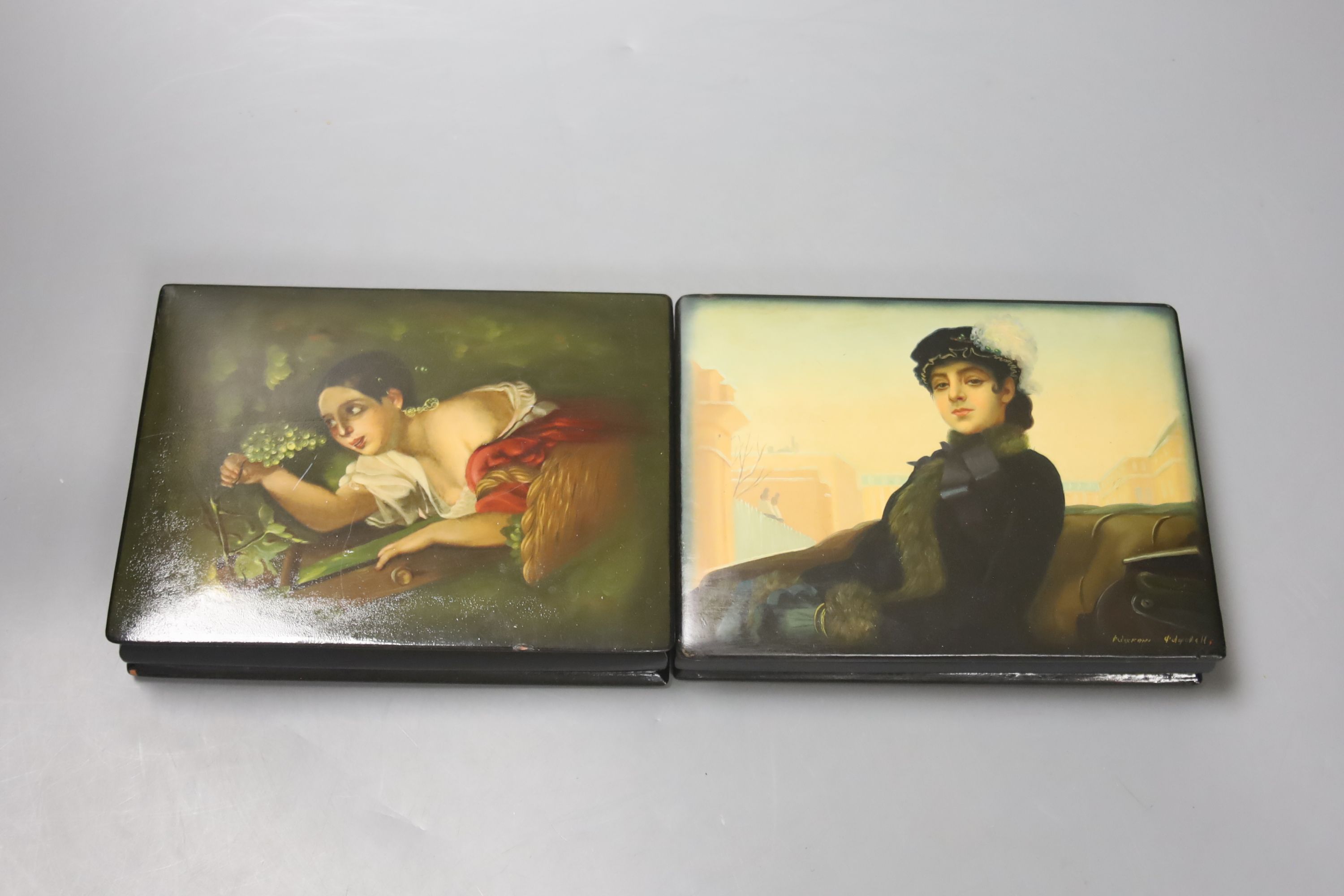 Two Russian papier mache boxes with hinged covers, each 17 x 13cm